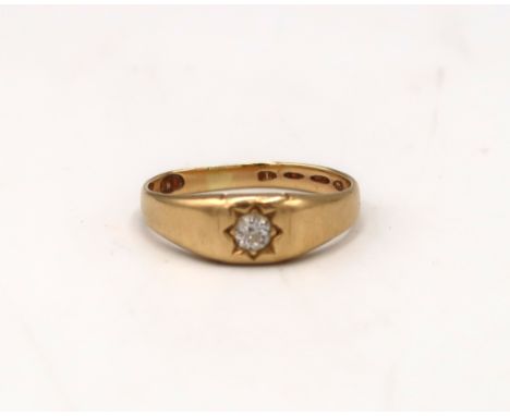 An 18ct gold old cut diamond gypsy set band ring. Estimated 0.25ct, G/H colour, VS2/SI1 clarity. Size S 1/2. Weight 4.96 gram