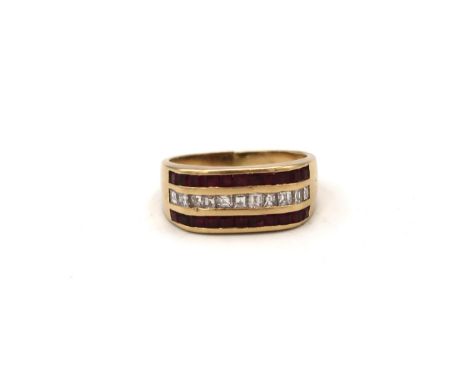 A square ruby and carre cut diamond three row dress ring. Stamped 750. Size R. Weight 6.11 grams. Split to band, requires rep