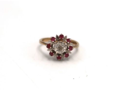 A 9ct gold ruby and diamond cluster ring, hallmarked, size P/Q, 2.8g.