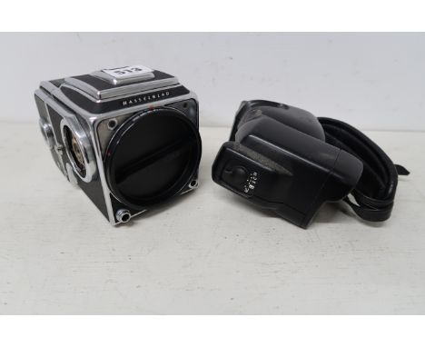 A Hasselblad 2000 FC/M with grip, suitable for spares.