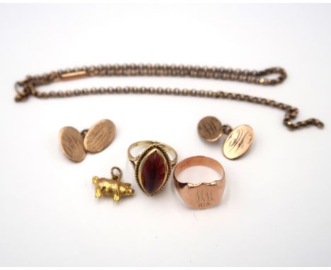 A collection of 9ct items to include a marquise garnet ring size M 1/2. A signet ring size N. A pig charm. A pair of engraved