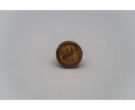 A 1911 George V gold half sovereign, in 9ct gold ring mount with textured finish, ring size N/O, total weight 10.6g.