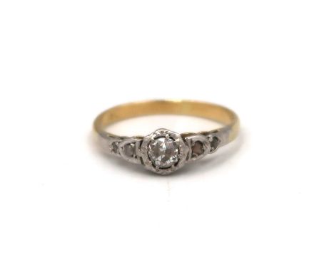 An old cut diamond illusion set ring. Stamped 18K. Size K. Weight 2.13 grams