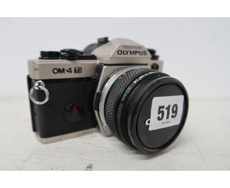An Olympus OM4Ti camera with F1.8/50mm lens, untested titanium body.