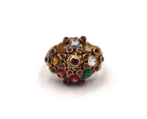 A bombe style multi gem cluster cocktail ring. Size Q. Tests 14ct. Weight 6.66 grams