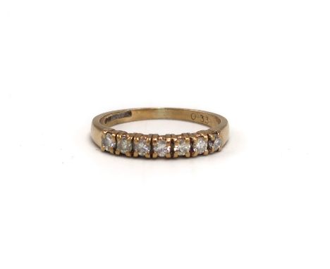 A 9ct gold half eternity ring, set with 0.33ct diamonds, hallmarked, size K, approx weight 1.6g