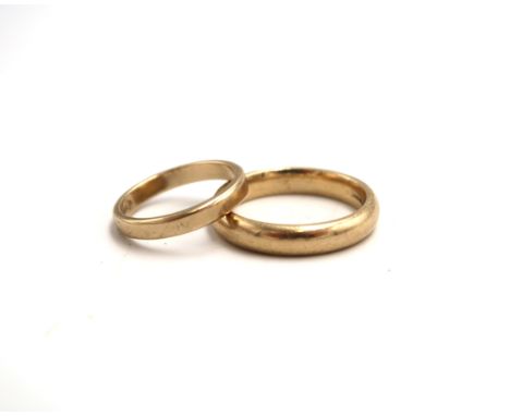 Two 9ct yellow gold hallmarked wedding bands - ring size R/S approx 5.3 grams and one size K approx weight 2.1 grams