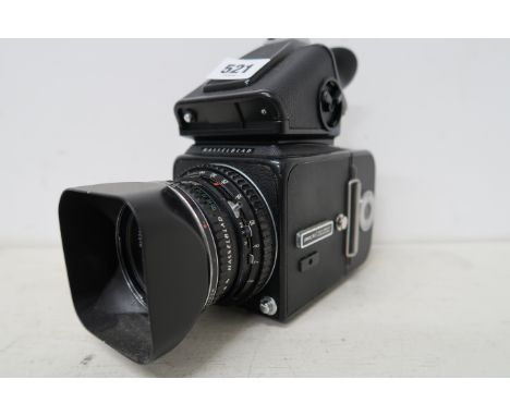 A Hasselblad 500 C/M camera with Planar F2.8/80mm lens.