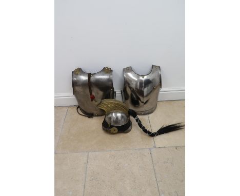 A French Second Empire M1858 Culrassier Troopers Helmet. Polished steel having a peak and lobster tail back edged with brass 