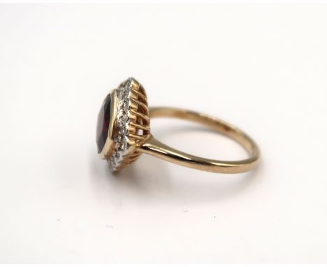 A 9ct yellow gold Art Deco style garnet and diamond ring - diamonds are well matched, bright and lively - head size approx 13