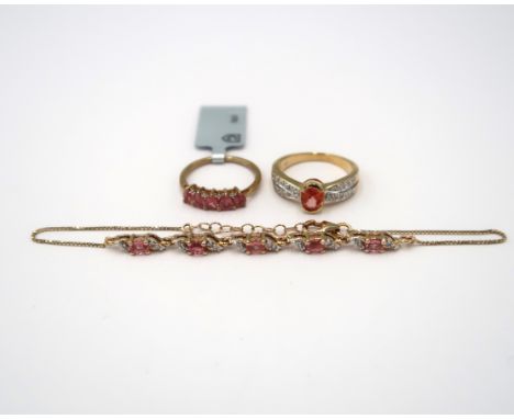 Three pieces of 9ct gold Padparsadscha sapphire jewellery. To include a pear shape five stone ring with zircon highlights. Si