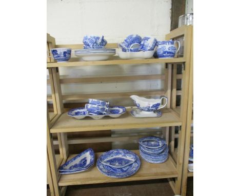 BLUE AND WHITE WARES IN THE SPODE ITALIAN PATTERN COMPRISING VARIOUS DESSERT BOWLS, COFFEE MUGS, SMALL JUGS, GRAVY BOAT, SIDE