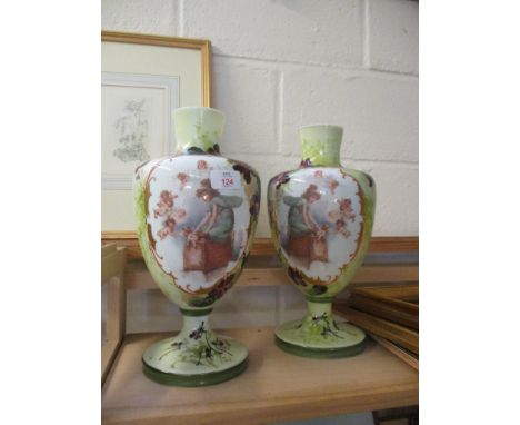 TWO CERAMIC VASES DECORATED WITH CHERUBS