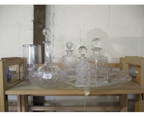 QUANTITY OF CUT GLASS WARES INCLUDING A NUMBER OF DECANTERS, FRUIT BOWL AND VASE