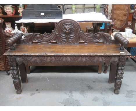 HEAVILY CARVED LONG NARROW BENCH
