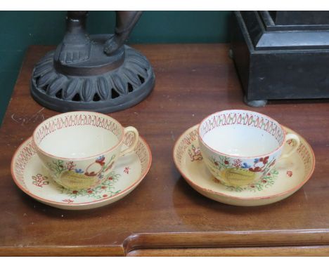 PAIR OF EARLY HANDPAINTED TEACUPS AND SAUCERS 