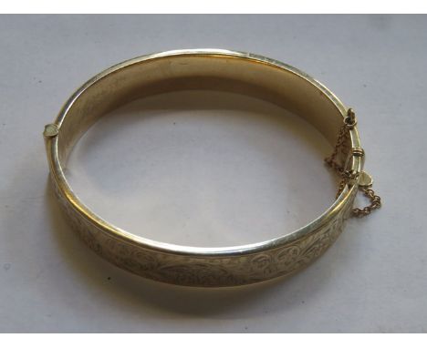9ct GOLD SNAP BANGLE 