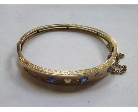9ct GOLD SNAP BANGLE SET WITH BLUE SAPPHIRES AND PEARL TYPE STONES 