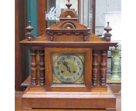 HONEY OAK CASED MANTEL CLOCK WITH ORMOLU MOUNTED DIAL 