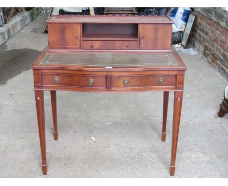 REPRODUCTION BOW FRONTED AND INLAID MAHOGANY TWO DRAWER WRITING DESK 