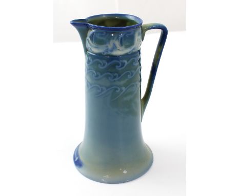 A Royal Worcester Sabrina ware porcelain jug with stylised wave decoration to the top, marks to the base for 1903 (af), heigh