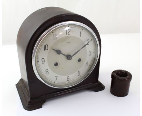 A 1930s Enfield Bakelite mantel clock, with two-train movement striking on coil, height 20cm and a small Bakelite portable as