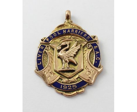 A 9ct rose gold and enamel pendant inscribed 'Liverpool Harriers & A.C. 1925' and dedicatory inscription to  'J.D. Sangster',