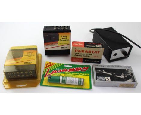 A Micro Seiki switch box, a box Shure stylus gauge, a boxed 'The Parastat Manual Model MK11A' record cleaning machine, a QED 