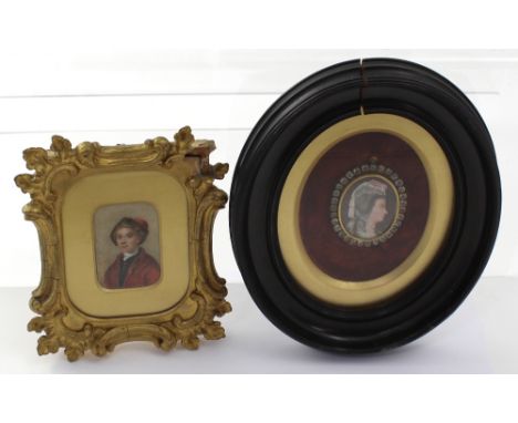 A 19th century portrait miniature on ivory depicting a young man in a fur hat, 6 x 4cm, framed and glazed and a further examp