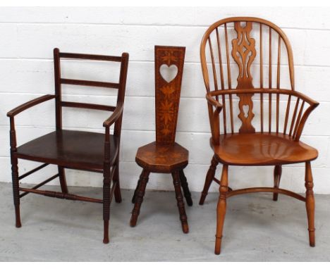 A light elm Windsor chair with crinoline stretcher, a Welsh spinning stool and a mahogany carver (3).