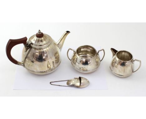 A silver three-piece tea service, with shallow fluted body, Barker Bros Ltd (later Barker Ellis Co Ltd), Birmingham 1948/49, 