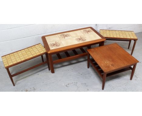 A retro mahogany coffee table with tile insert to top, a nest of two retro side tables with tiled tops and a retro coffee tab