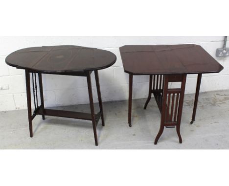 An Edwardian mahogany Sutherland table and an Edwardian shaped leaf Pembroke table with boxwood stringing and shelf stretcher