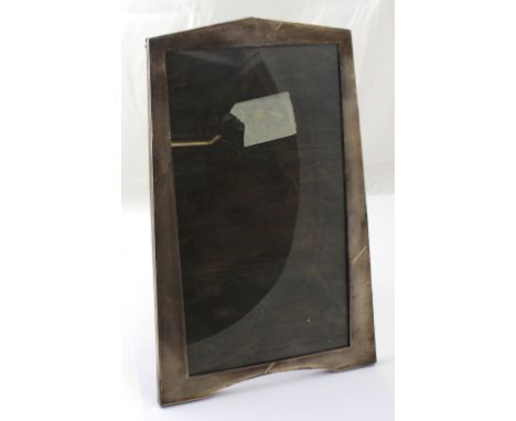 A large hallmarked silver engine-turned picture frame, J W Tiptaft & Son Ltd, Birmingham 1930, height 43cm, width 28cm, taper