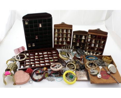 A mixed lot of costume jewellery to include bracelets, necklaces, brooches etc, also a collection of ceramic thimbles.