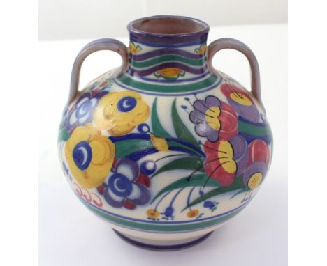 A Poole pottery twin-handled floral-decorated vase, height 18cm.