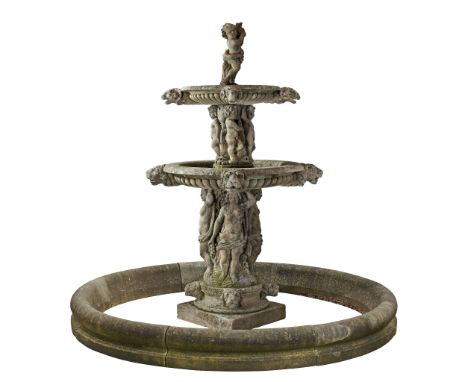 A Continental sculpted limestone three tier, figural garden fountain A Continental sculpted limestone three tier, figural gar