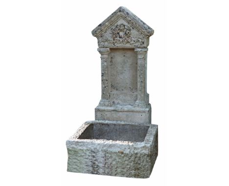 A French carved limestone wall fount with basin, 19th century  A French carved limestone wall fount with basin,   19th centur