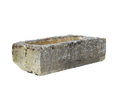 A French rough hewn limestone trough, 19th century, or rectangular form  A French rough hewn limestone trough,   19th century
