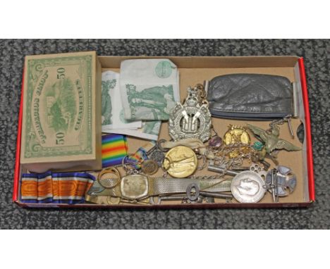 A box of assorted items including a WWI pair award to lieutenant R Haddock, yellow metal, bank notes, jewellery etc. 