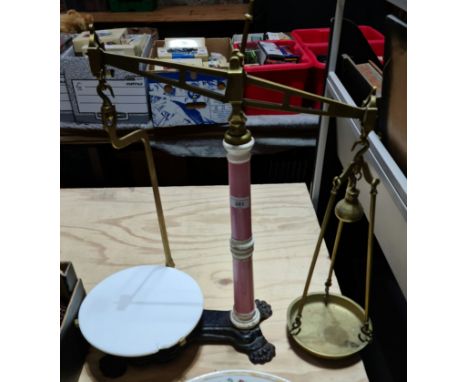 A set of Victorian cast iron and brass balance scales. 