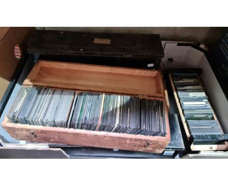 Six boxes of assorted Magic Lantern slides.