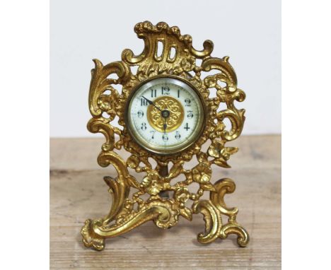 An ornate gilt metal mantle clock, height 17cm. 
