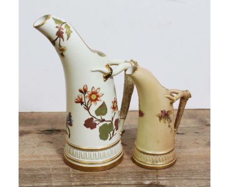 A pair of Royal Worcester Tusk Jugs, no. 1116, height 16cm &amp; 23cm. 