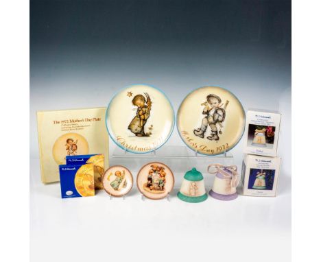 Hand painted in matte finish. Includes Festival Harmony Second Edition 1994 Christmas Bell, Celestial Musician First Edition 