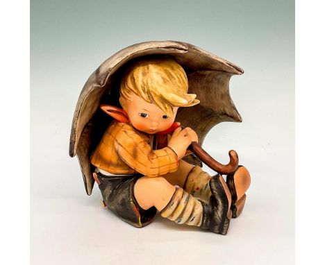 Hand painted seated figurine under a large umbrella. Goebel Hummel backstamp. Artist: Maria Innocentia HummelIssued: 1957Dime