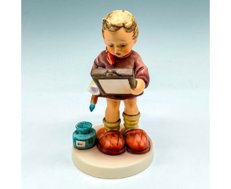 Figural is posed with art supplies and finished canvas. Matte finished with brown, red and orange coloration. Goebel backstam