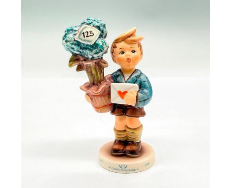 Hand painted figure of a young boy holding a potted plant and a letter. Goebel backstamp. This item has its original box: 7.5