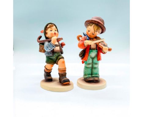 Hand painted porcelain figures. The Run A-Way (HUM 327) a young boy with a cane and basket of flowers. Little Fiddler (HUM 2/