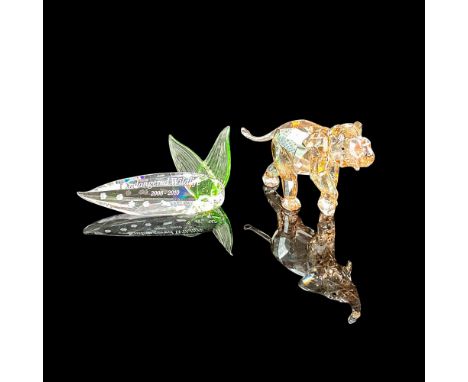 Amber crystal figural with inset jet crystal eyes with trunk up. Includes Endangered Wildlife 2008 - 2010 plaque. Swarovski b
